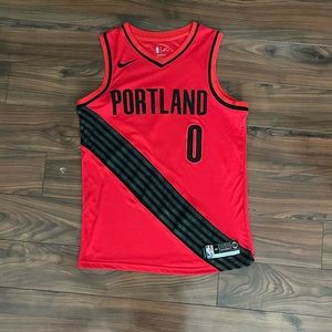 Damian Lillard red and black Portland Trailblazers jersey in men’s small size